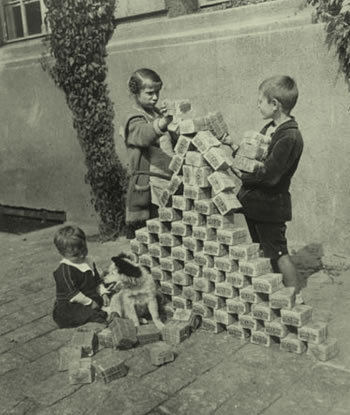 German Children Playing With Money